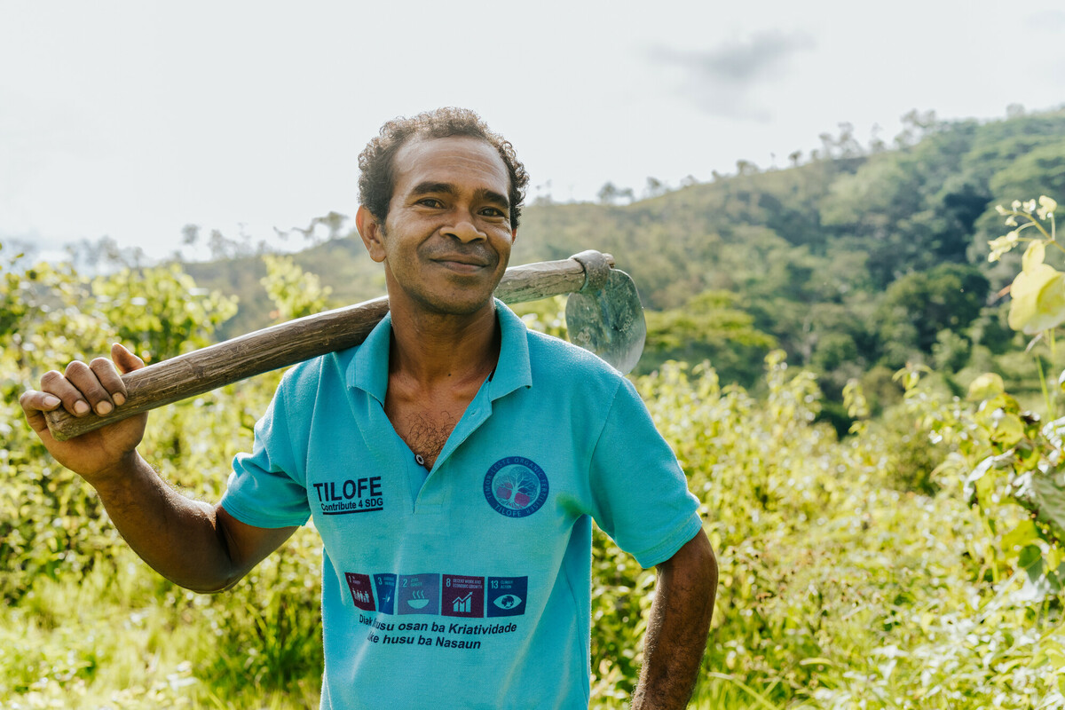 Timor-Leste: Ronaldo at Timor-Leste Organic Fertiliser Enterprise (TILOFE) who produce Timor-Leste’s only commercial organic fertiliser and is also conserving water at his property in Ermera through reforestation. Photo: Keith Parsons/Oxfam.